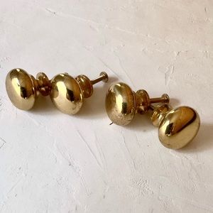 4 antique brass knobs